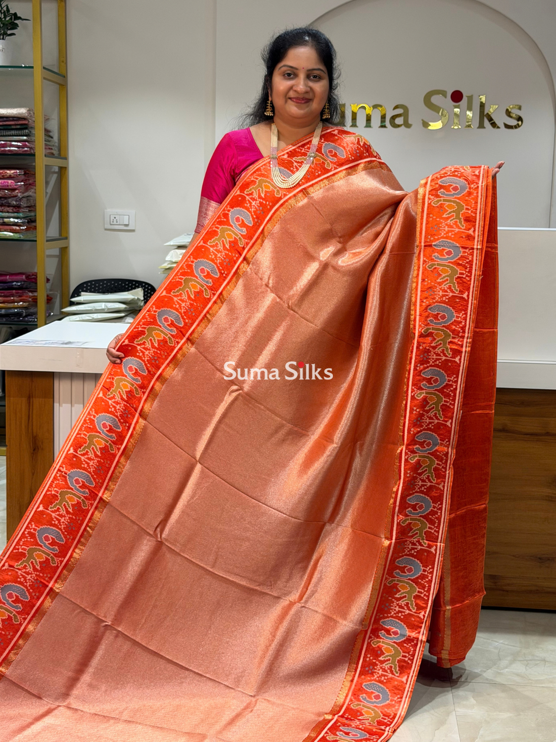 Brocade Tissue with Patola Border Saree Orange Color