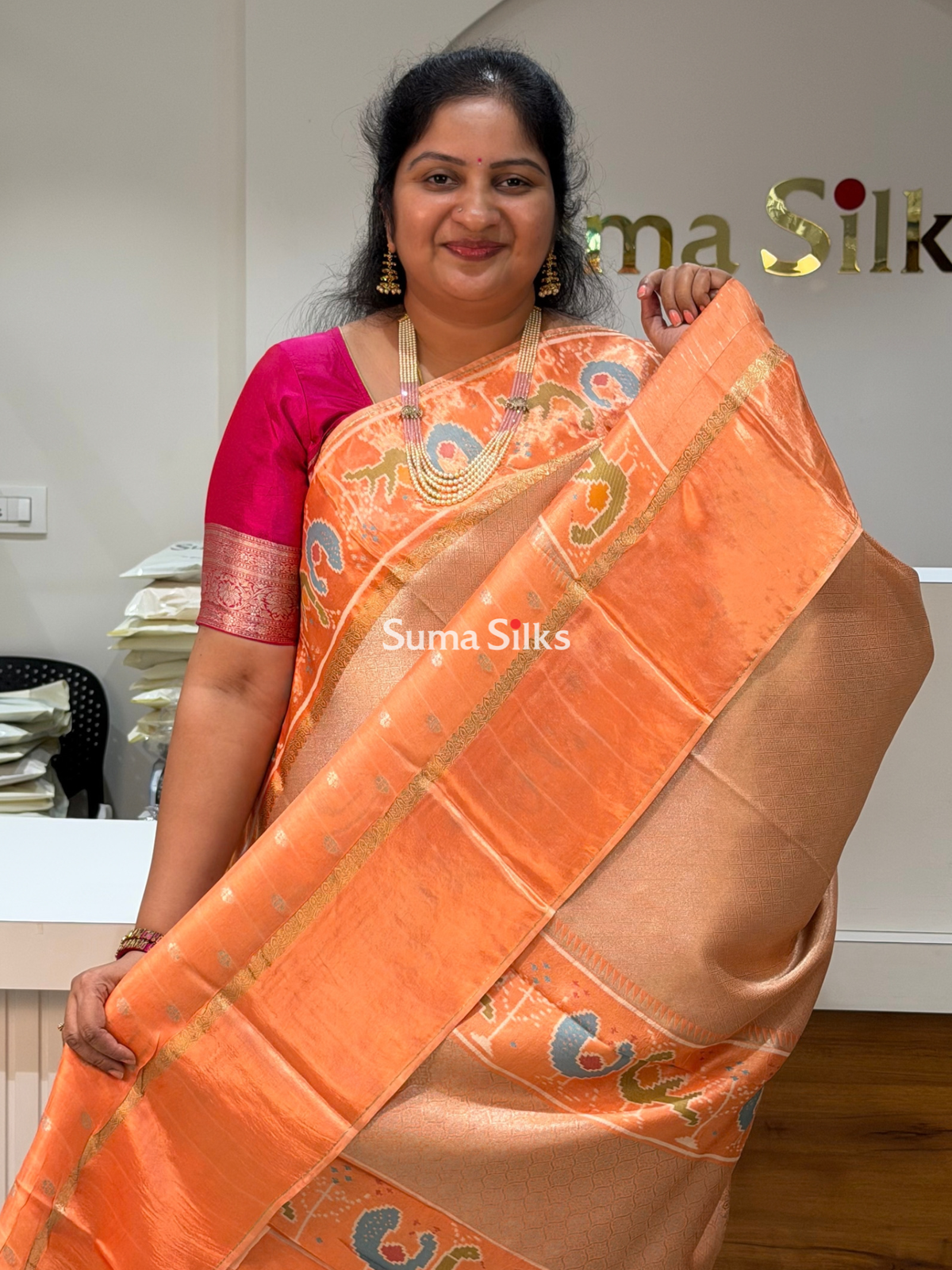 Brocade Tissue with Patola Border Saree Peach Color