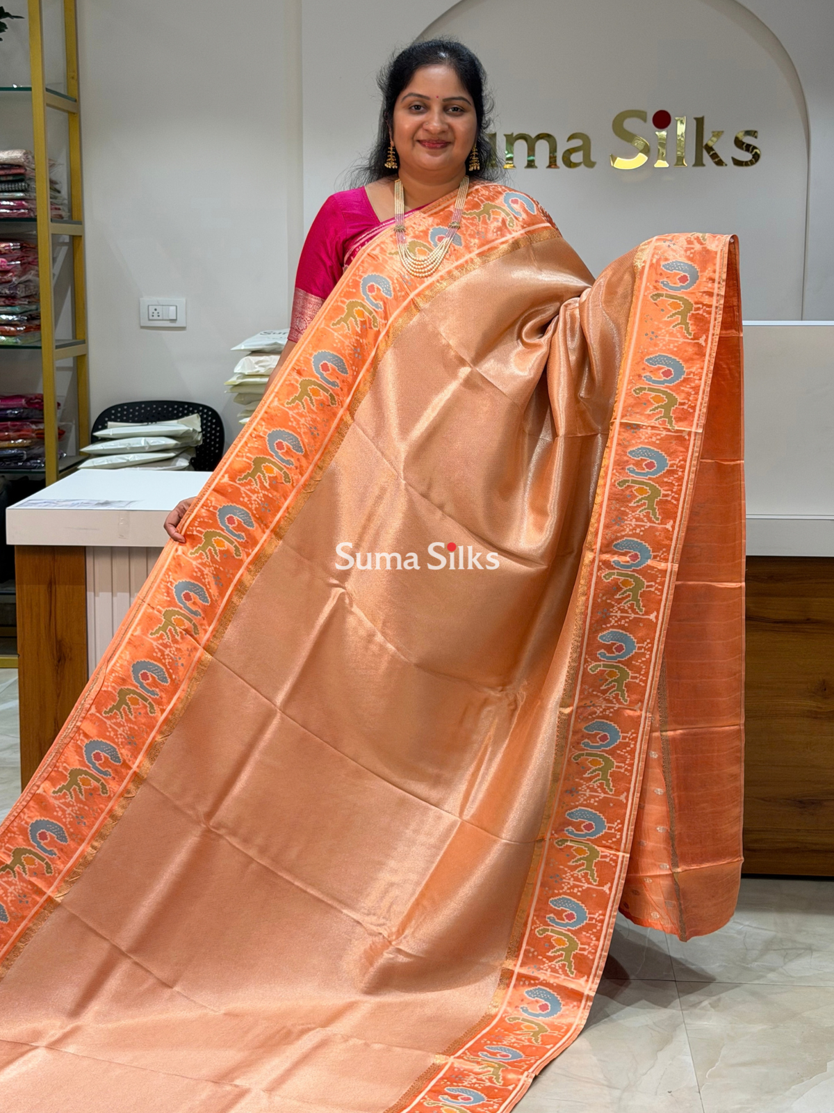 Brocade Tissue with Patola Border Saree Peach Color
