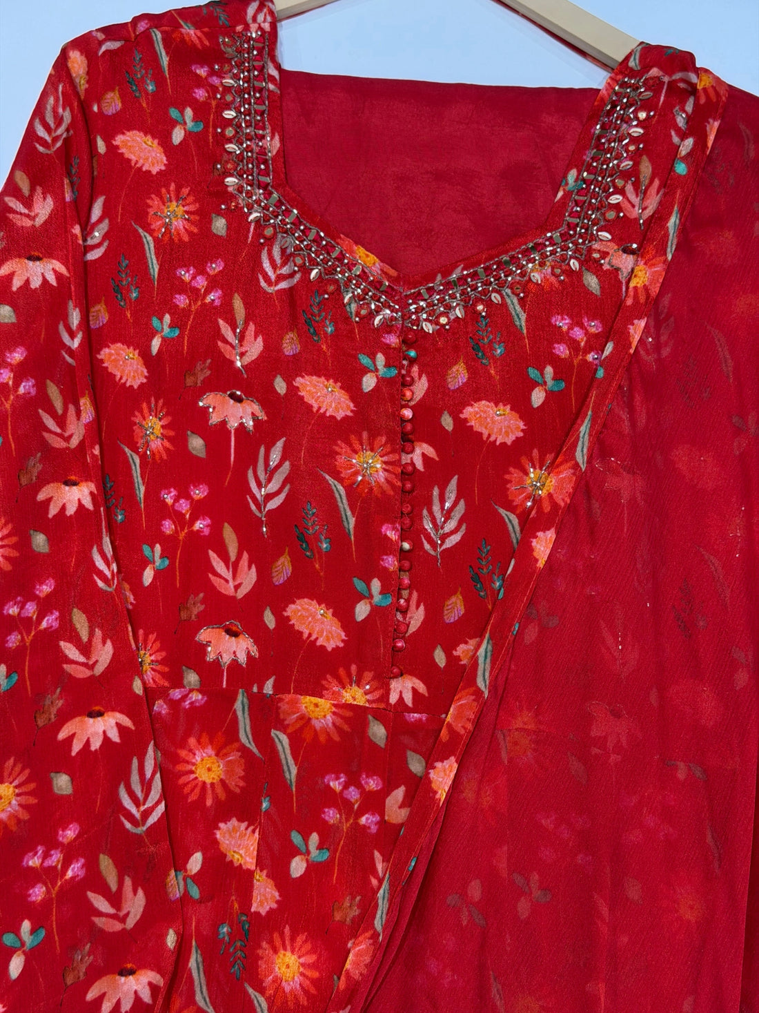 Chinnon Georgette Orange Color Fancy Suit with Kaddhana Work on Neck.