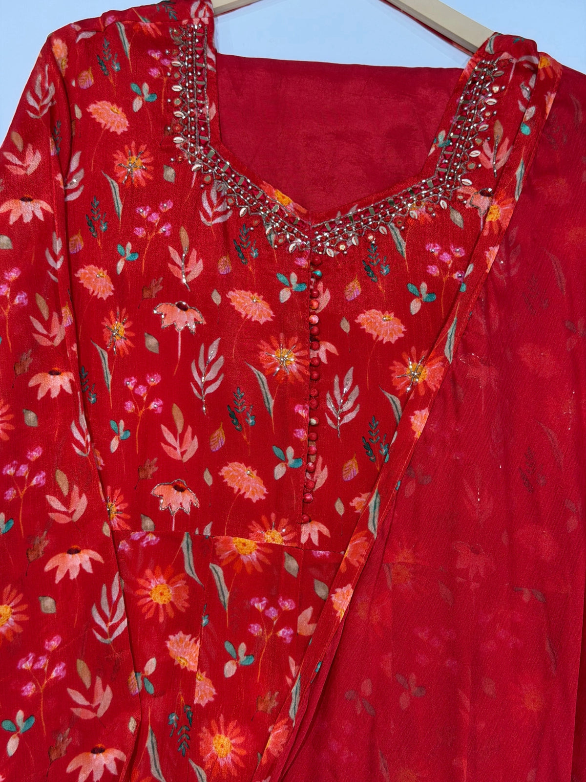 Chinnon Georgette Orange Color Fancy Suit with Kaddhana Work on Neck.