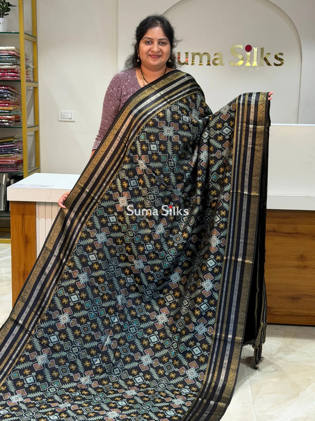 Moonga Crepe Navratan Patola Saree Black Color