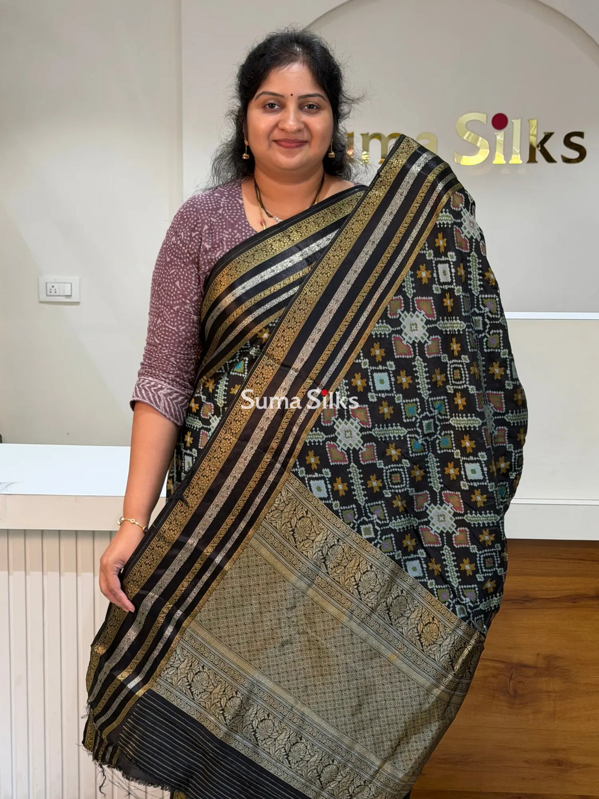 Moonga Crepe Navratan Patola Saree Black Color