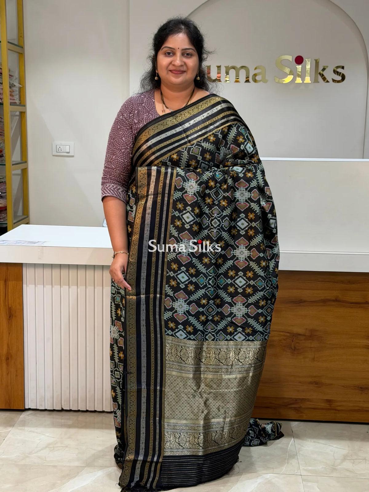 Moonga Crepe Navratan Patola Saree Black Color