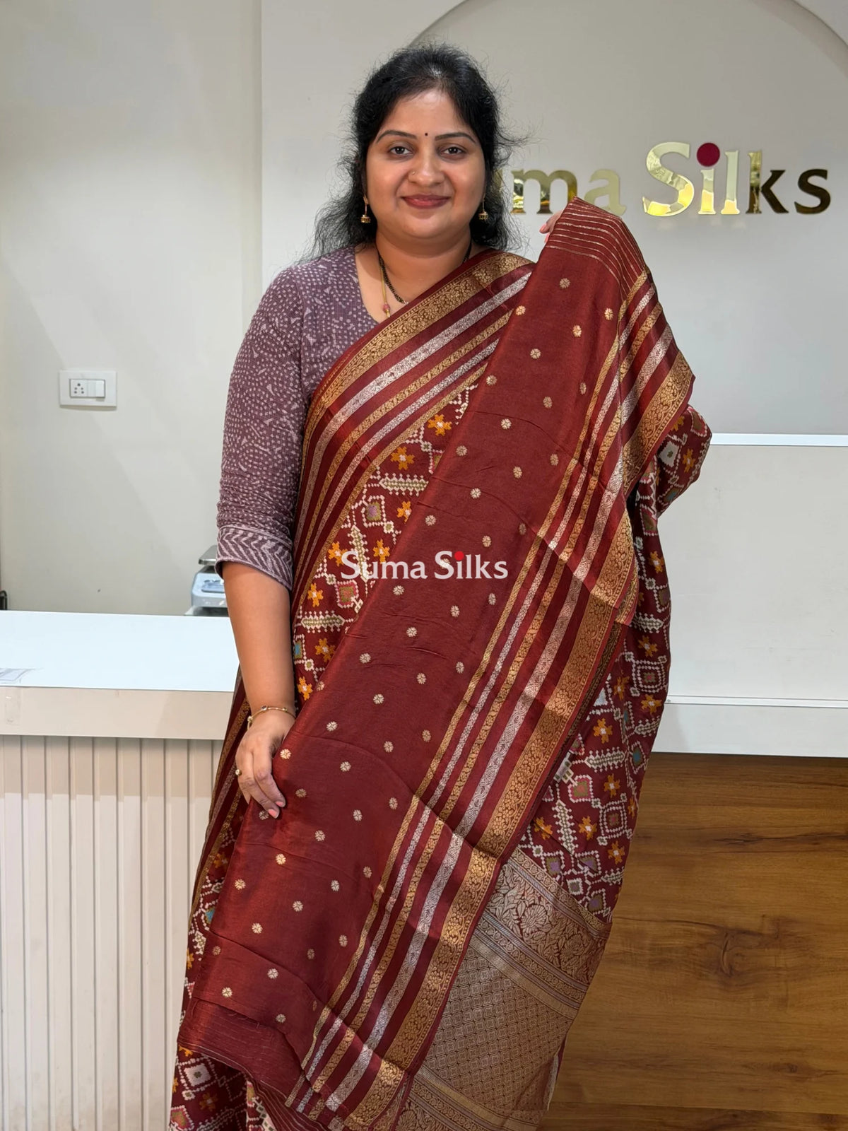 Moonga Crepe Navratan Patola Saree Brown Color