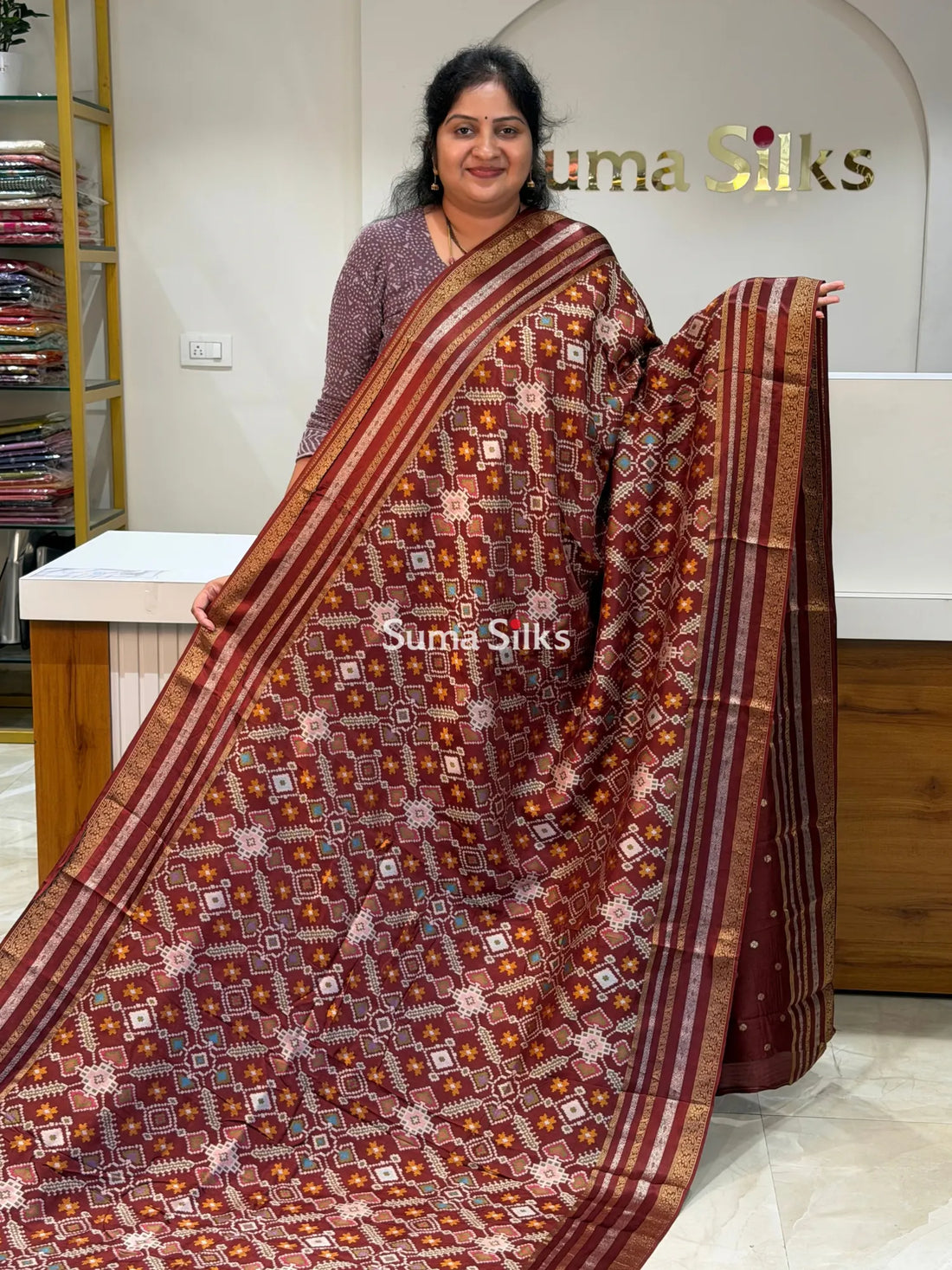 Moonga Crepe Navratan Patola Saree Brown Color