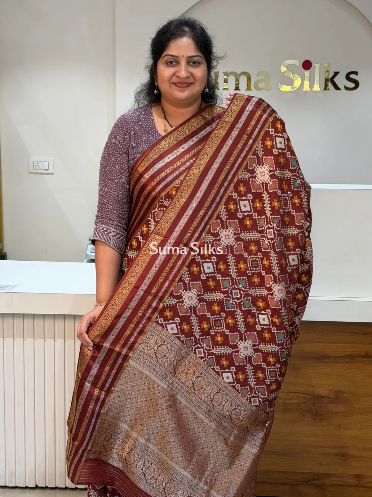 Moonga Crepe Navratan Patola Saree Brown Color