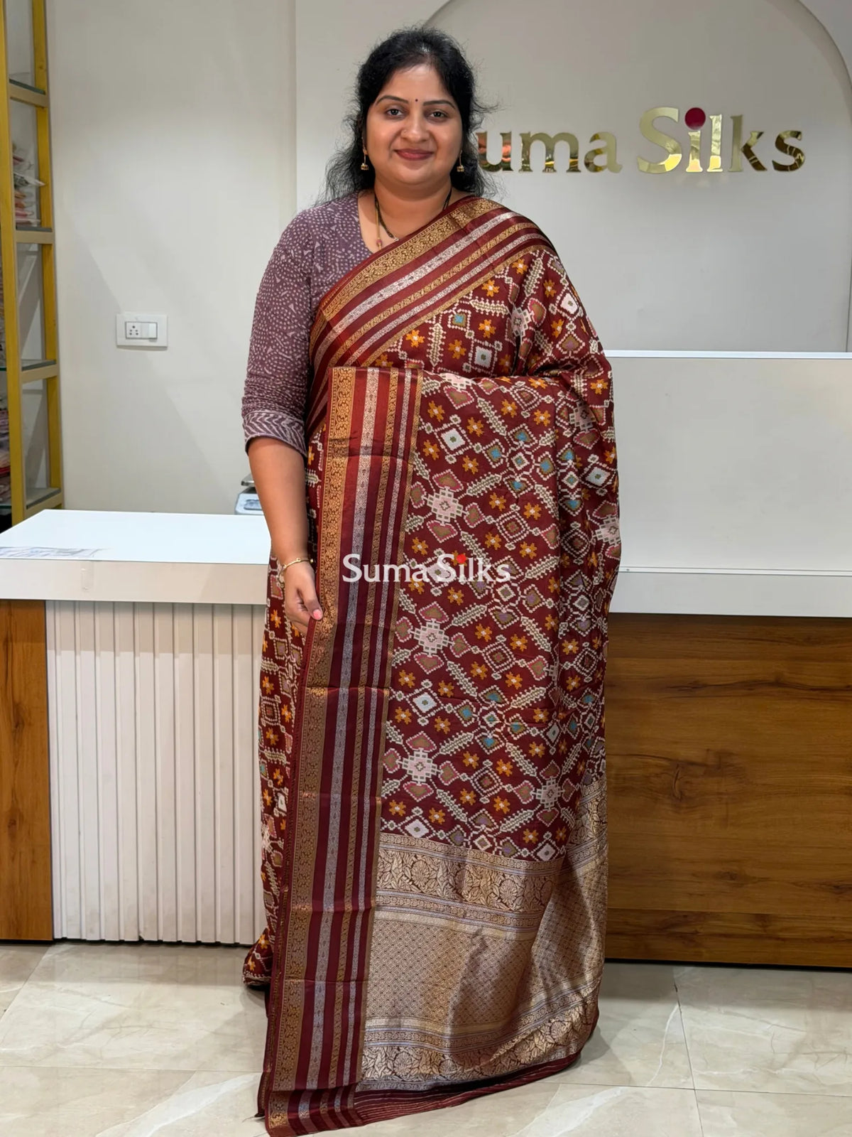 Moonga Crepe Navratan Patola Saree Brown Color