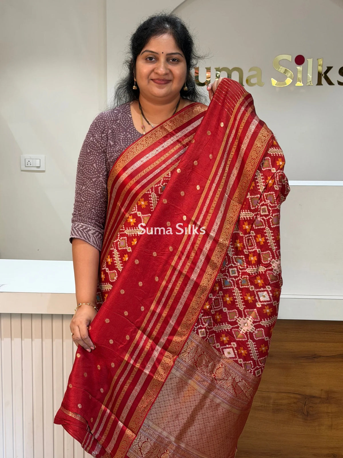 Moonga Crepe Navratan Patola Saree Rust Color