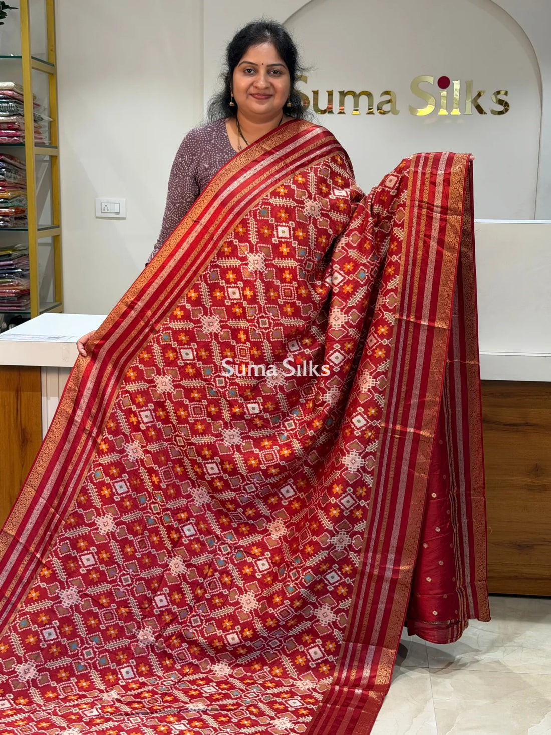 Moonga Crepe Navratan Patola Saree Rust Color