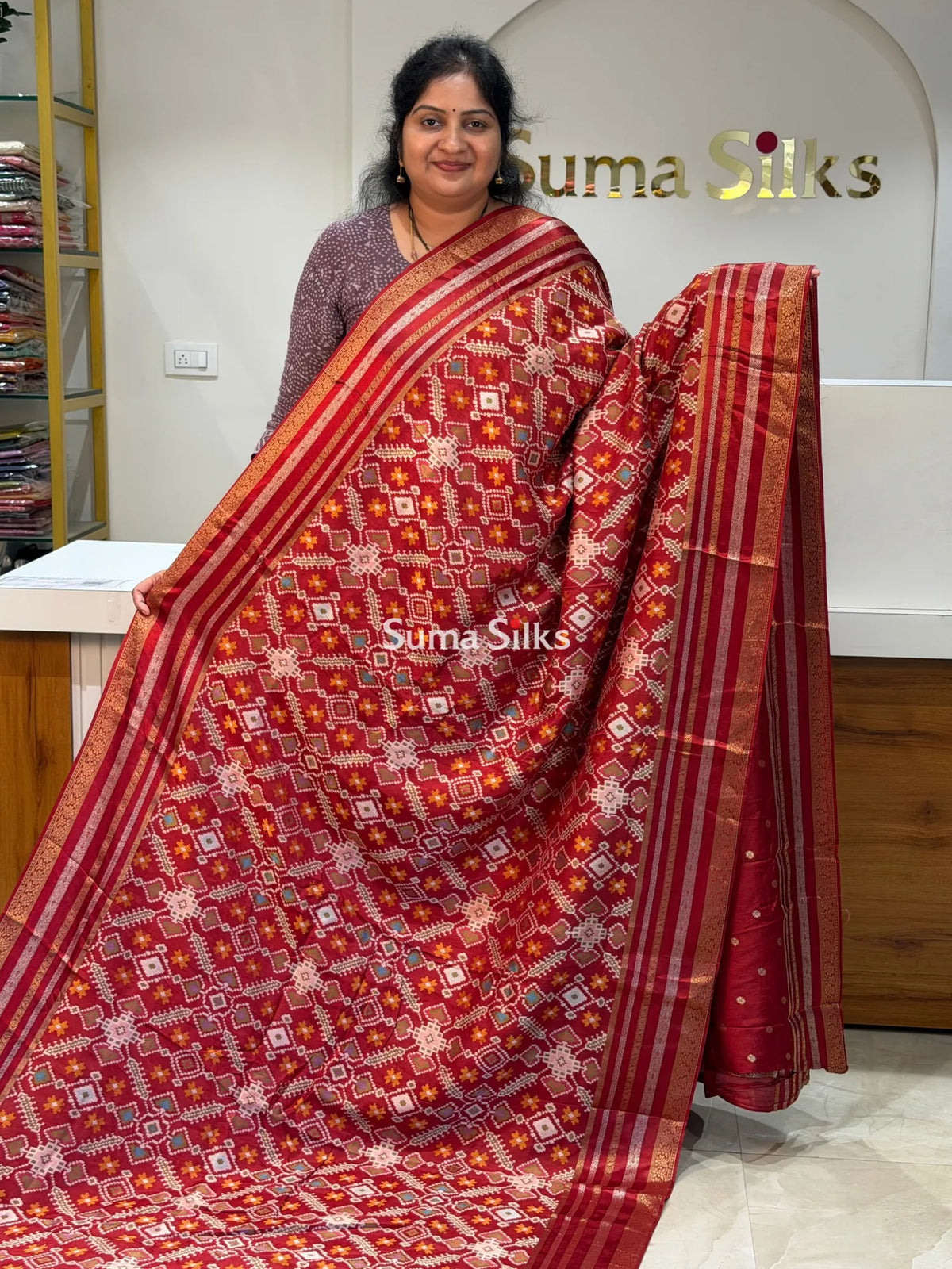 Moonga Crepe Navratan Patola Saree Rust Color