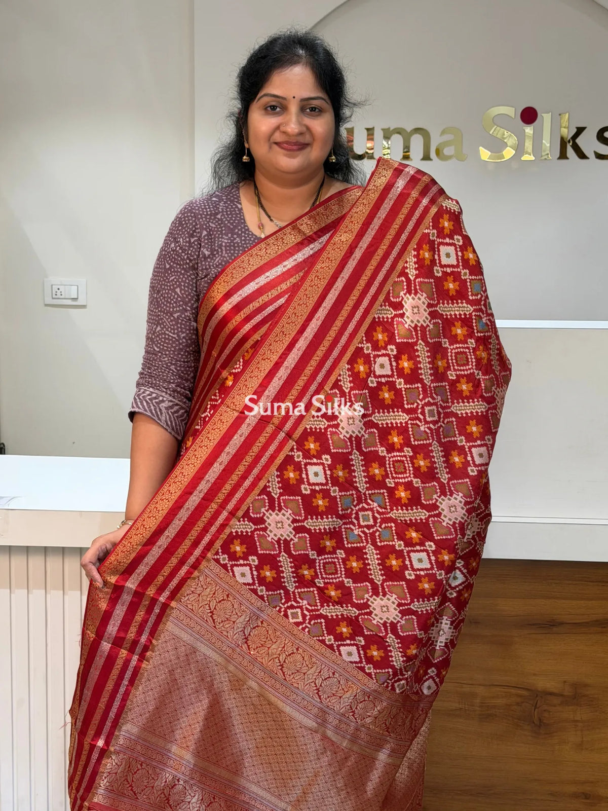 Moonga Crepe Navratan Patola Saree Rust Color