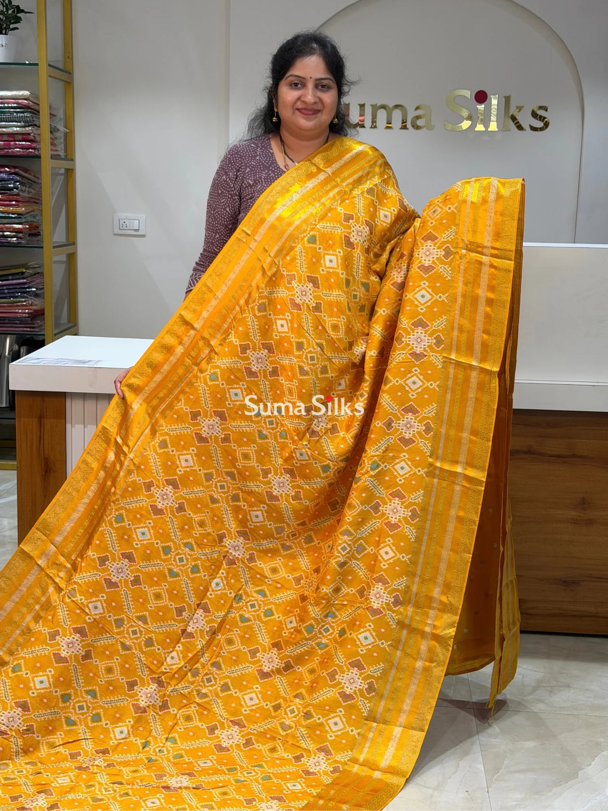 Moonga Crepe Navratan Patola Saree Yellow Color