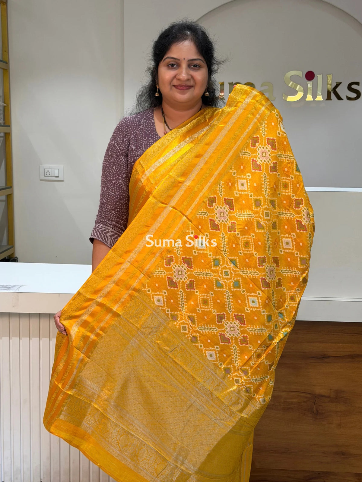 Moonga Crepe Navratan Patola Saree Yellow Color