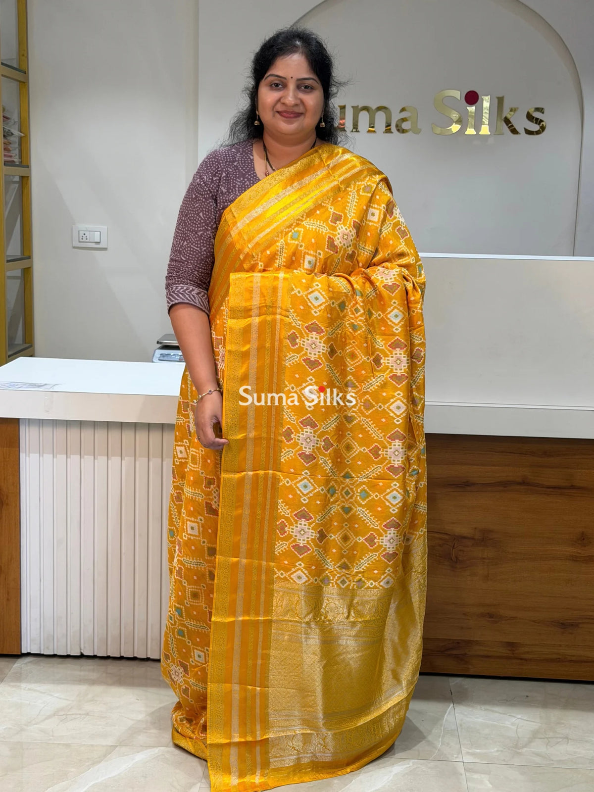 Moonga Crepe Navratan Patola Saree Yellow Color