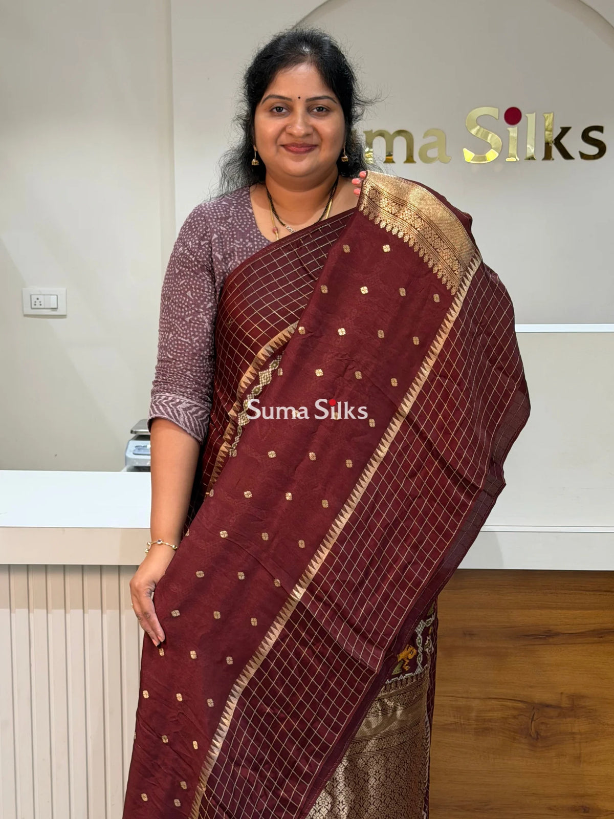 Moonga Crepe Patola Checks Border Saree Brown Color
