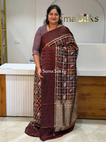 Moonga Crepe Patola Checks Border Saree Brown Color