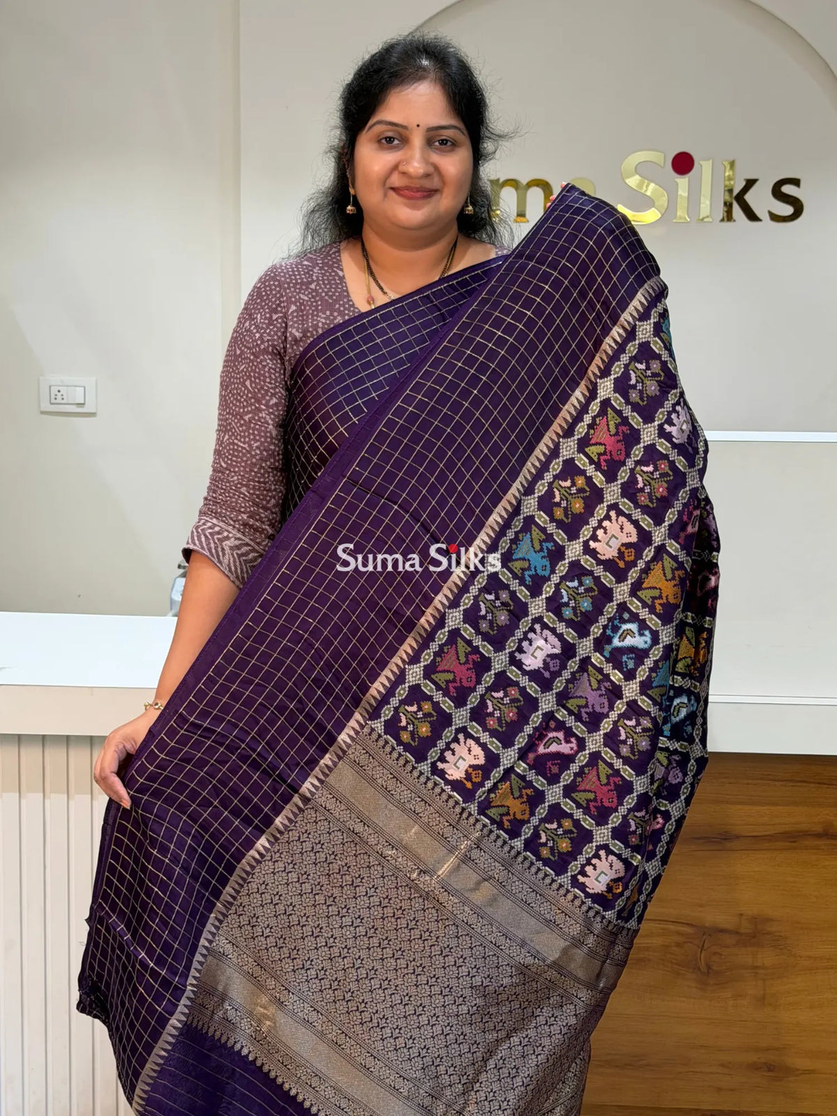 Moonga Crepe Patola Checks Border Saree Purple Color