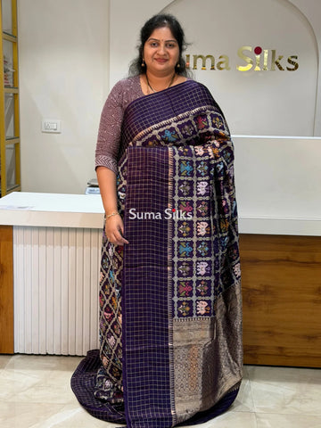 Moonga Crepe Patola Checks Border Saree Purple Color