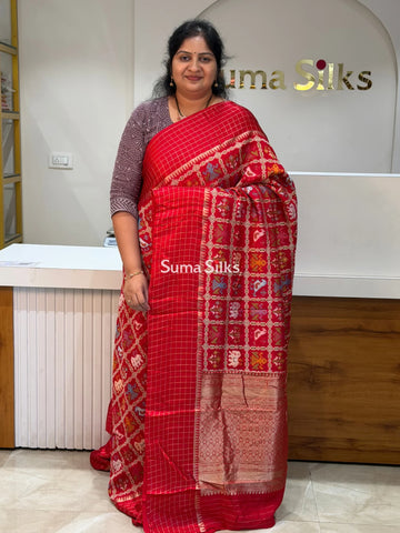 Moonga Crepe Patola Checks Border Saree Red Color